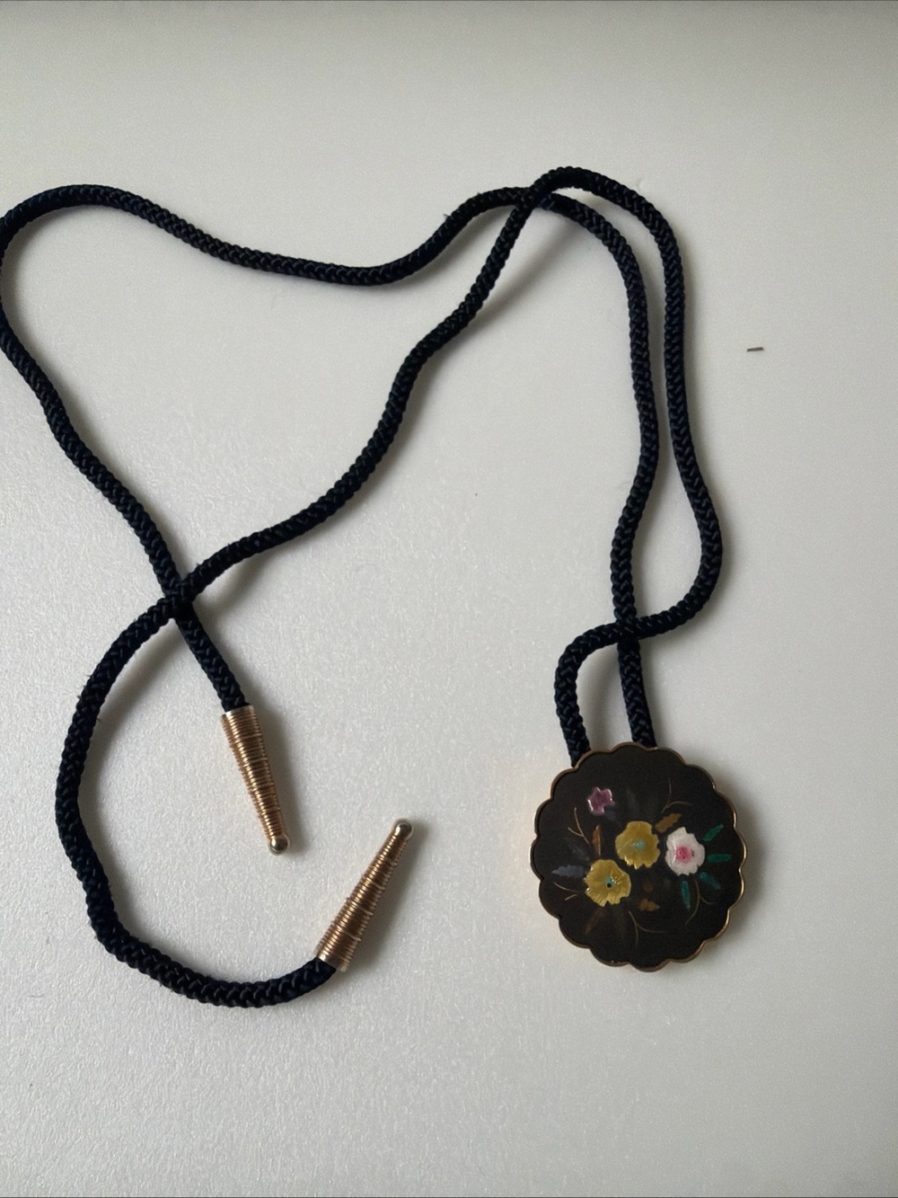 Black Floral Bolo Tie Necklace with Gold Accents